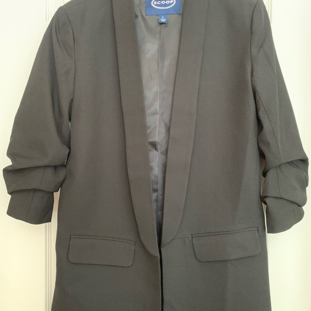 Blazer jacket in black. Size Small. 3/4 sleeves. Machine wash cold.